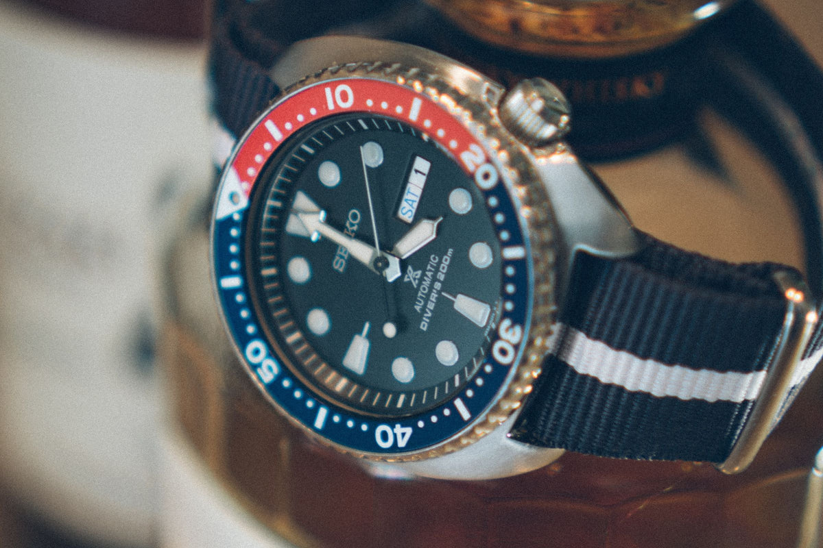 NATO Strap History, Evolution, & Top Picks Band & Bezel